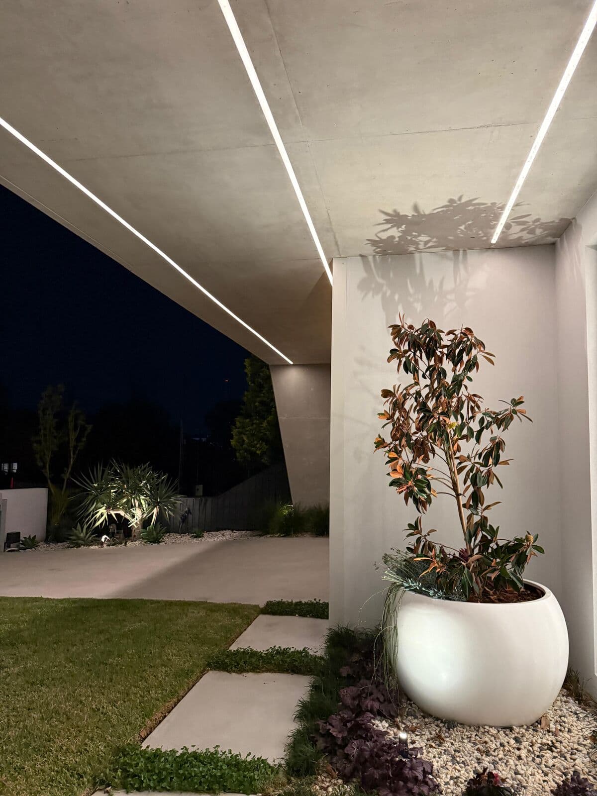 Covered outdoor area with a line of ceiling lighting