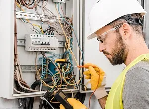 Electrician-In-Ashfield-Repairing-Switchboard